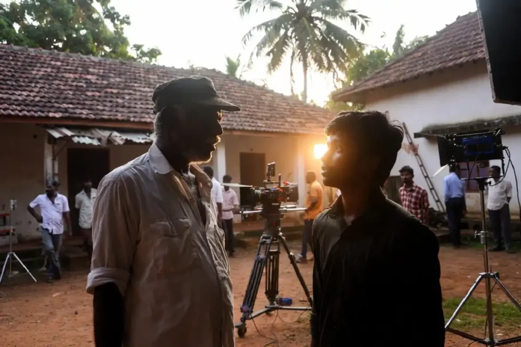 Father and son in a dramatic scene from Ashakal Aayiram Malayalam movie 2026